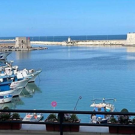 شقة Emozioni Dal Porto تراني المظهر الخارجي الصورة