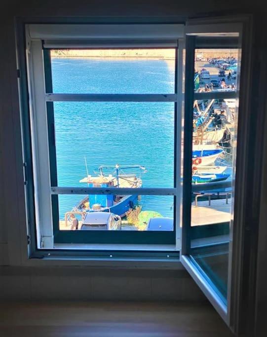 شقة Emozioni Dal Porto تراني المظهر الخارجي الصورة